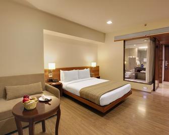 Hotel Temple Tree Shirdi - Shirdi - Bedroom