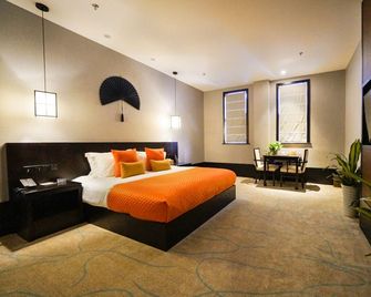 Kangle Mumianwan Hotel - Xuzhou - Bedroom