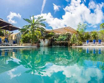 Kokomo Botanical Resort - Caribbean Family Cottages - Providenciales - Pool