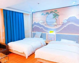 Zhenghao Business Hotel (Qingxin Sports Center) - Qingyuan - Bedroom
