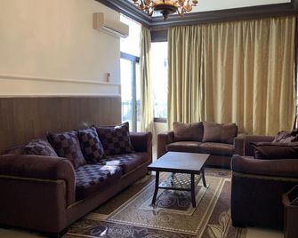 Alaamira Furnished Apartments - Chiyah - Living room