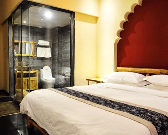 Dunhuang Jinshed Times Yododo Inn - Jiuquan - Bedroom