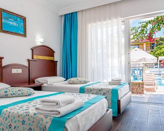 Side Sunberk Hotel - Side - Bedroom