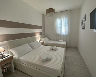 Hotiday Porto Cesareo - Porto Cesareo - Habitación