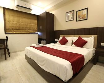 Hotel Privya Surat - Rooms and Banquet - Surat - Schlafzimmer