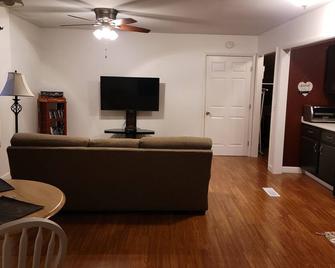 Nestled around 18 acres. Close to trails and a lake. - Otsego - Living room