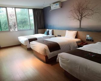 Pai Hotel Chongqing Wanzhou Gao Suntang Business Town - Dazhou - Bedroom