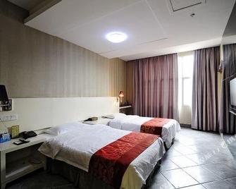 Super 8 by Wyndham Putian Feng Huang Shan Zhuang - Putian - Habitación