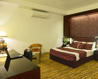 Amazon Lilly Lake View Residence - Dhaka - Phòng ngủ