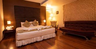 Grand Gardenia - Tiruchirappalli - Bedroom