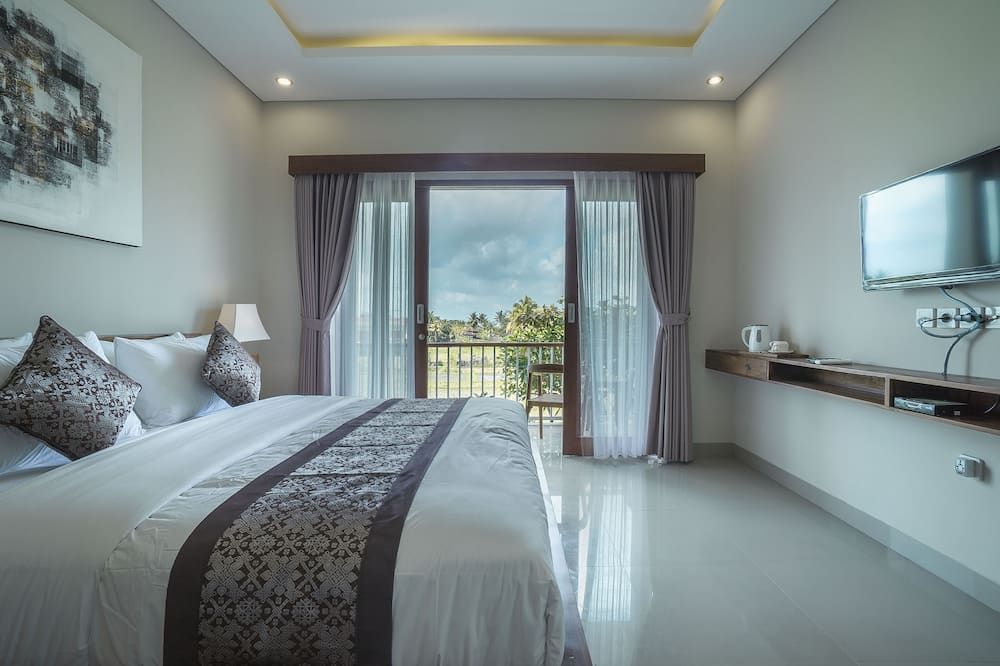 Putih Dcarik Ubud - אובוד - חדר שינה