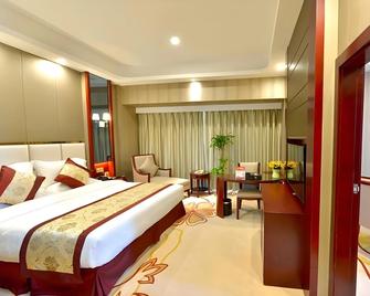 Greentree Eastern Zigong Huashang International City Huichuan Road Hotel - Zigong - Bedroom