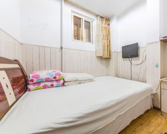 Shun Feng Yuan Hostel - Qingdao - Habitación