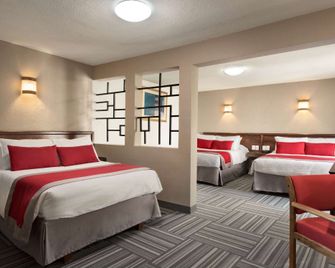 Ramada Plaza by Wyndham Leon - לאון - חדר שינה