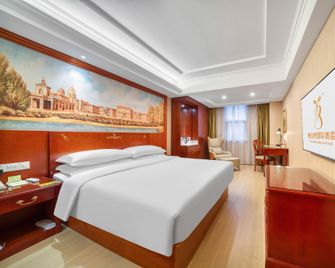 Vienna International Hotel Ningbo Huancheng South Road Branch - Ningbo - Schlafzimmer