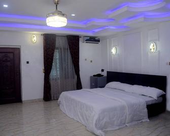 Mexiloyd Luxury Rooms & Suites - Port Harcourt - Schlafzimmer