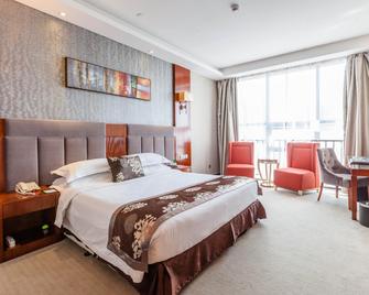 Yichang Guobin Bandao Hotel - Yichang - Slaapkamer