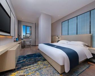 Echarm Hotel Huanggang Ist Xihu Road Juran Home - Huanggang - Bedroom