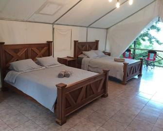 Volcano Tenorio Glamping Ranch - 3 Tents - Katira - Bedroom