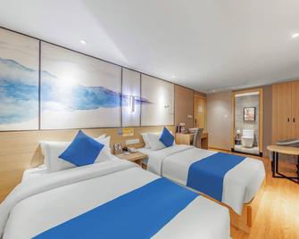 Guangzhou Hongcheng Hotel - גואנגג'ואו - חדר שינה