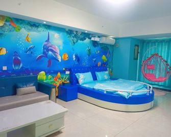 Xuyanuo Theme Hotel (Dezhou Wanda Plaza Branch) - Dezhou - Спальня