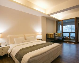 Tsuwu Hot Spring Hotel - Jinshan District - Schlafzimmer