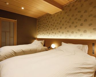 Togetsutei Hotel - Kyoto - Bedroom