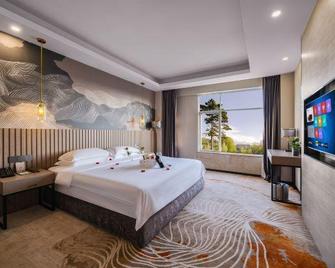 Minfeng International Hotel - גילין - חדר שינה