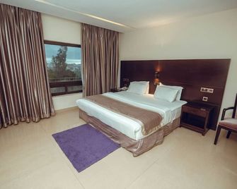 Noble House Hotel - Кумасі - Спальня