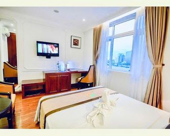 Orange Hotel - Da Nang - Sovrum