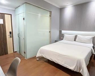 G-Hotel Pontianak - Pontianak - Habitació
