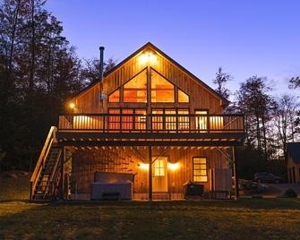 This house is a 3 bedroom(s), 3 bathrooms, located in Sunderland, VT. - Sandgate - Building