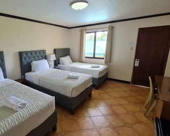 Marvin's Seaside Inn - Naval - Bedroom