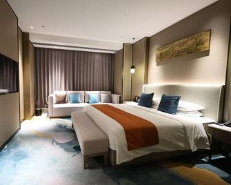 Xintai International Hotel - Weihai - Slaapkamer
