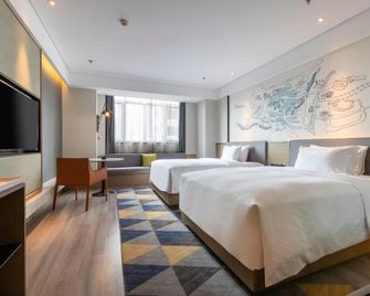 Wanda Moments Hotel - Heze - Camera da letto