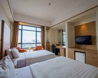Grand Pasundan Convention Hotel - Bandung - Schlafzimmer