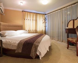 Xinhui Hotel - Shanghai - Bedroom