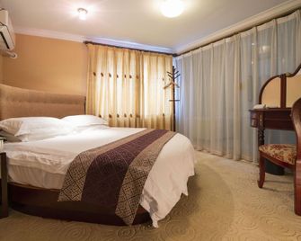 Xinhui Hotel - שנחאי - חדר שינה