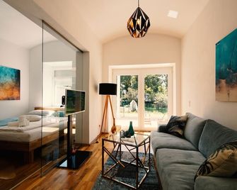 Well-maintained design apartment in a villa location - Klagenfurt - Sala de estar