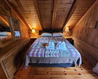 1876 - Heritage Cabin at Pine Ridge Park - Pembroke - Schlafzimmer