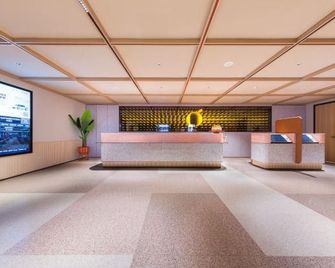 Orange Hotel (Beijing Shaoyaoju University of International Business and Economics) - Beijing - Front desk