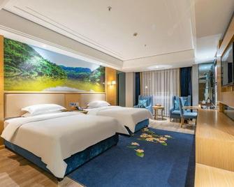 Baihai Holiday Inn - Leshan - Schlafzimmer