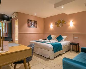 Le Central Boutique Hôtel - בון - חדר שינה