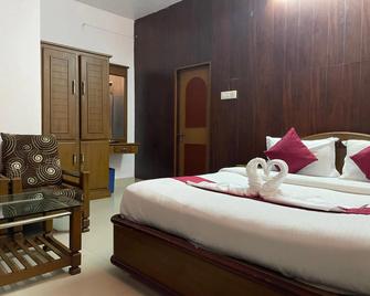 Hotel Caveri - Madikeri