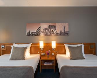 Leonardo Hotel Köln Bonn Airport - Cologne - Bedroom