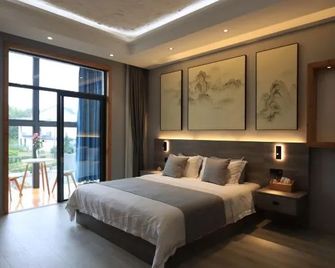 East Garden Boutique Hotel - Huangshan - Slaapkamer