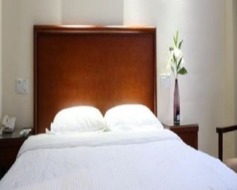 Greentree Inn Anhui Bozhou West Guangming Road Tangwang Avenue Shall Hotel - Bozhou - Спальня