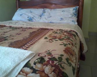 Georgies Harvest Motel - Mukono - Camera da letto