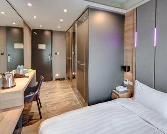 Kiwi Share Hotel Zhongli - Tchao-jüan - Ložnice