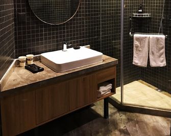 Taoxian Town Boutique Hotel (Taoxian Airport Branch) - Shenyang - Schlafzimmer